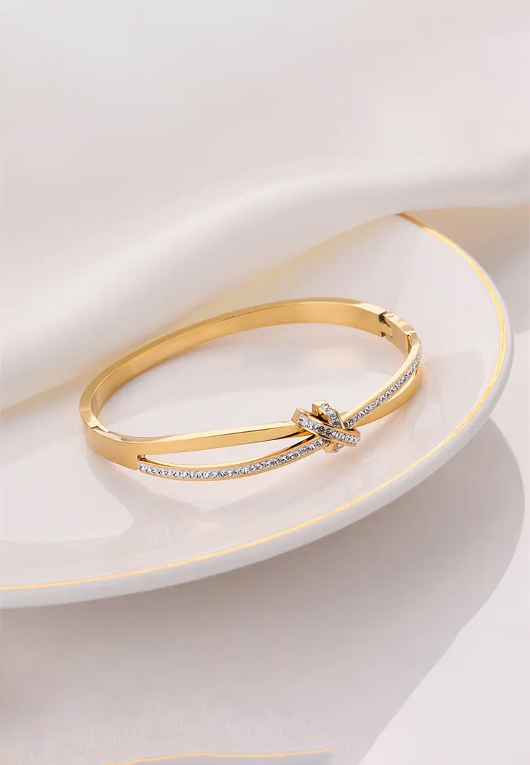 Belle Shimmering Knot Cubic Zirconia Bangle in Gold