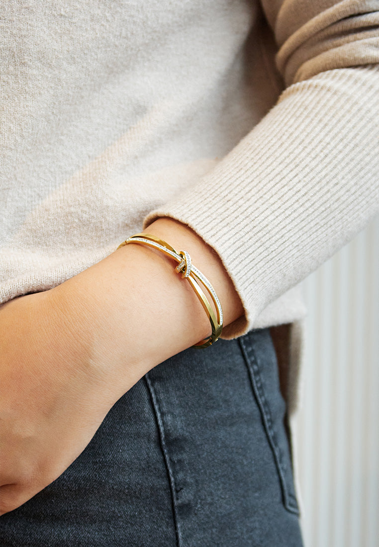 Belle Shimmering Knot Cubic Zirconia Bangle in Gold