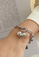 Celovis Jewellery Saint Heart Engravable Pendant on Multi Chain Link Bracelet